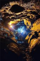 consider a trip into an ancient lava tube at the Gruta Caves 